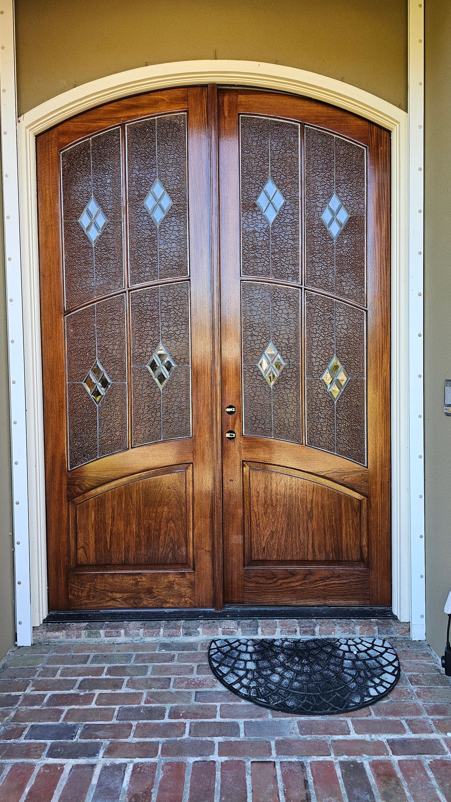 Refinished arched double entry doors